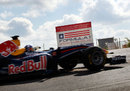 David Coulthard drives his Red Bull through the gates of the Circuit of the Americas