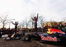 Mark Webber and Sebastian Vettel wave to their fans