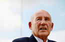 Sir Stirling Moss in the paddock