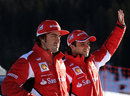 Fernando Alonso and Felipe Massa salute some fans at Ferrari's annual media event Wrooom