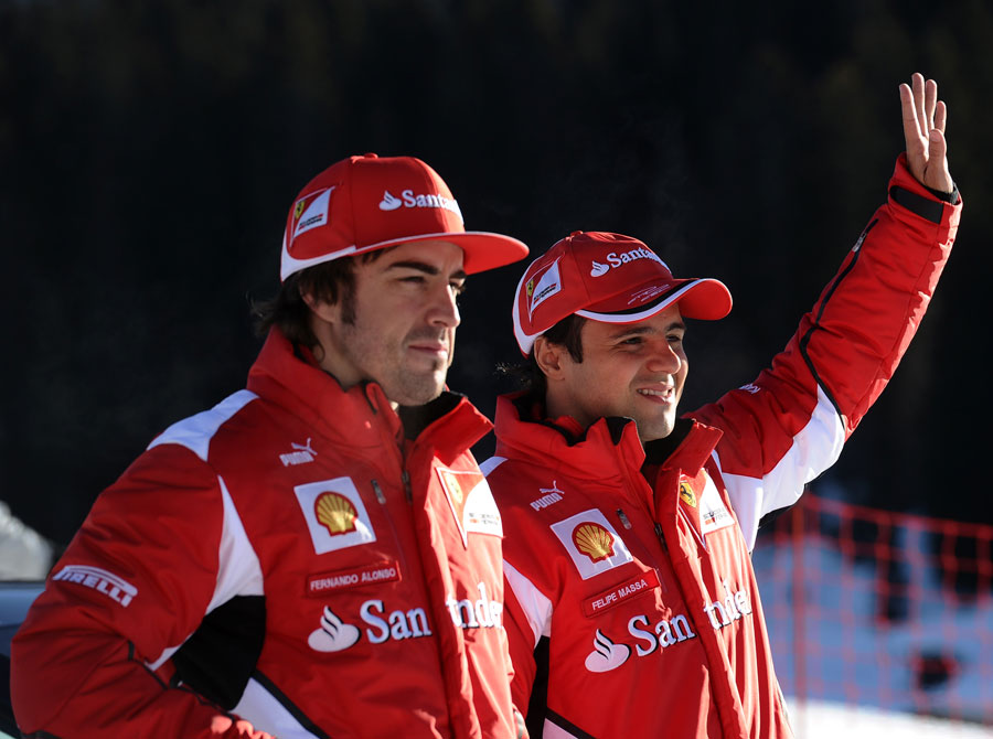 Fernando Alonso and Felipe Massa salute some fans at Ferrari's annual media event Wrooom