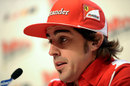Fernando Alonso answers questions in a press conference at Ferrari's annual media event Wrooom