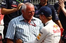 Red Bull owner Dietrich Mateschitz congratulates Sebastian Vettel on his victory
