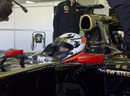 Kimi Raikkonen waits in the garage during a private test for Lotus