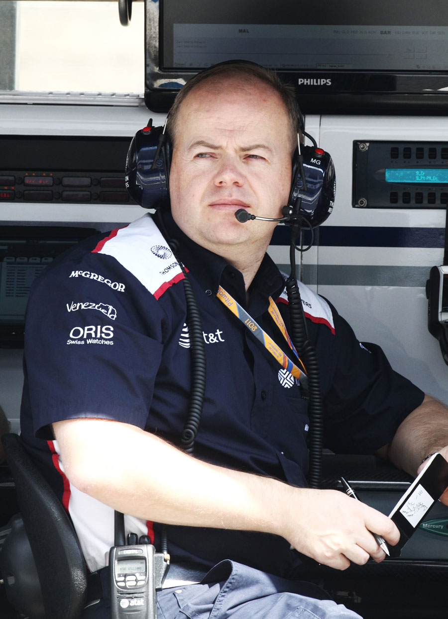 Mark Gillan watches over proceedings on the Williams pit wall