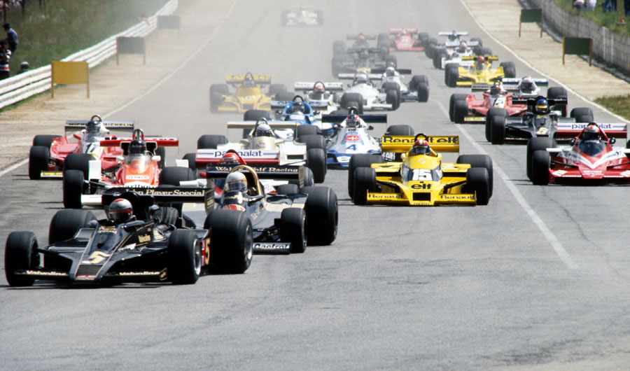 Mario Andretti leads Jody Scheckter in to turn one, with eventual race winner Ronnie Peterson back in 11th