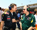 New Lotus technical director Mark Smith talks to Red Bull's Paul Monaghan on the grid
