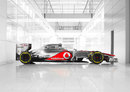 The new McLaren MP4-27 in a corridor of the team's factory