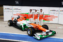 Paul di Resta, Nico Hulkenberg and Jules Bianchi pose with the new VJM05