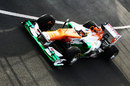 Paul di Resta leaves the pit lane in the Force India VJM05