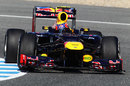 Mark Webber clips the apex in the RB8