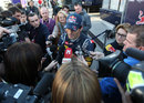 Mark Webber talks to the press following his first run in the Red Bull RB8