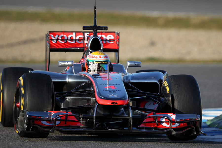 Lewis Hamilton gets to grips with the new McLaren MP4-27 for the first time
