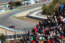 Jean-Eric Vergne attacks the circuit as the fans search for a glimpse of Fernando Alonso