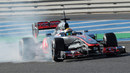 Lewis Hamilton locks up under braking for turn one