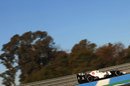 Kamui Kobayashi exits the pit lane