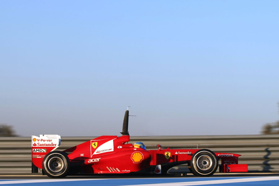 Fernando Alonso exits the pit lane