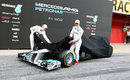 Michael Schumacher and Nico Rosberg start to reveal the W03