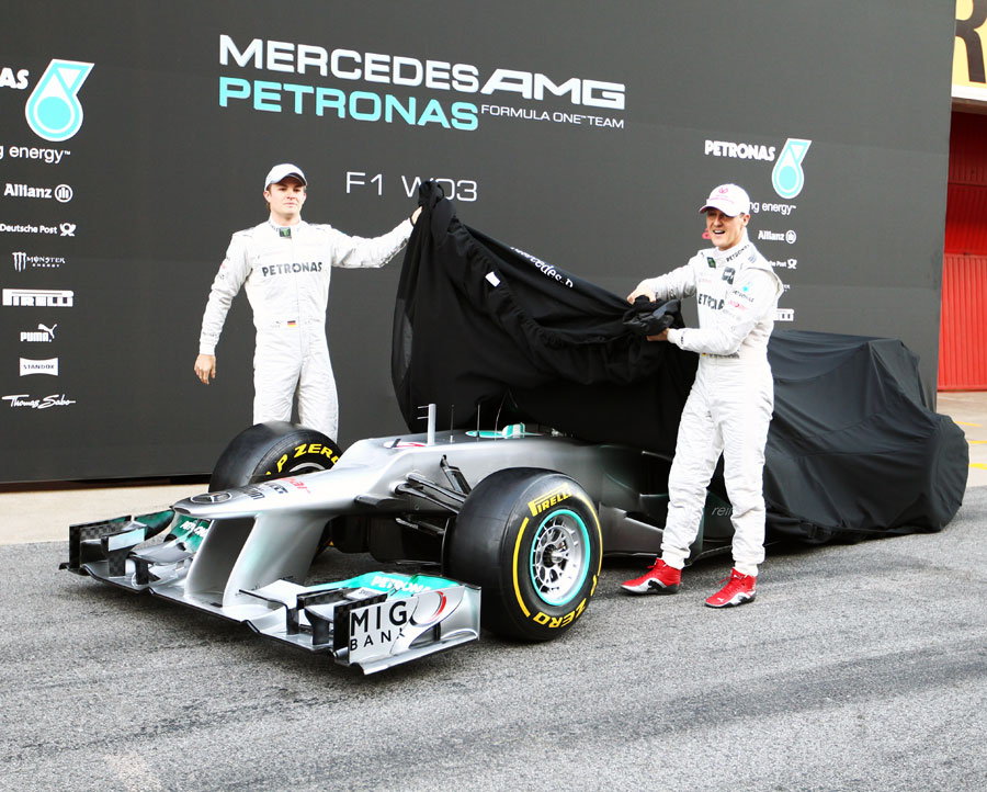 Michael Schumacher and Nico Rosberg unveil the stepped nose on the W03