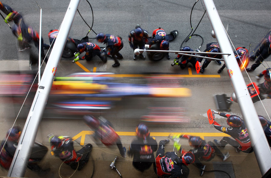 Mark Webber comes in for Red Bull to practise a pit stop