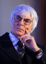 Bernie Ecclestone listens at the announcement of Tata Communications becoming Formula One's official connectivity provider
