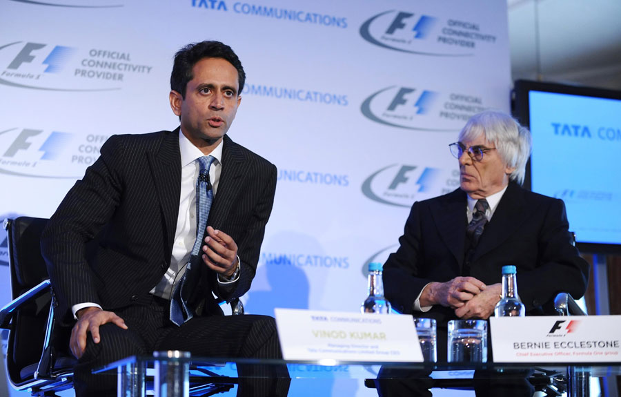 Bernie Ecclestone listens to Tata Communications CEO Vinod Kumar at the announcement of Tata becoming Formula One's official connectivity provider