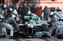 Mercedes complete a tyre change on Nico Rosberg's car