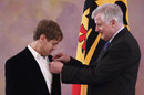 Sebastian Vettel receives the silver laurel leaf, Germany's highest sporting award, at the Presidential Bellevue Palace