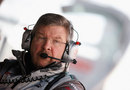 Ross Brawn keeps an eye on proceedings from the pit wall