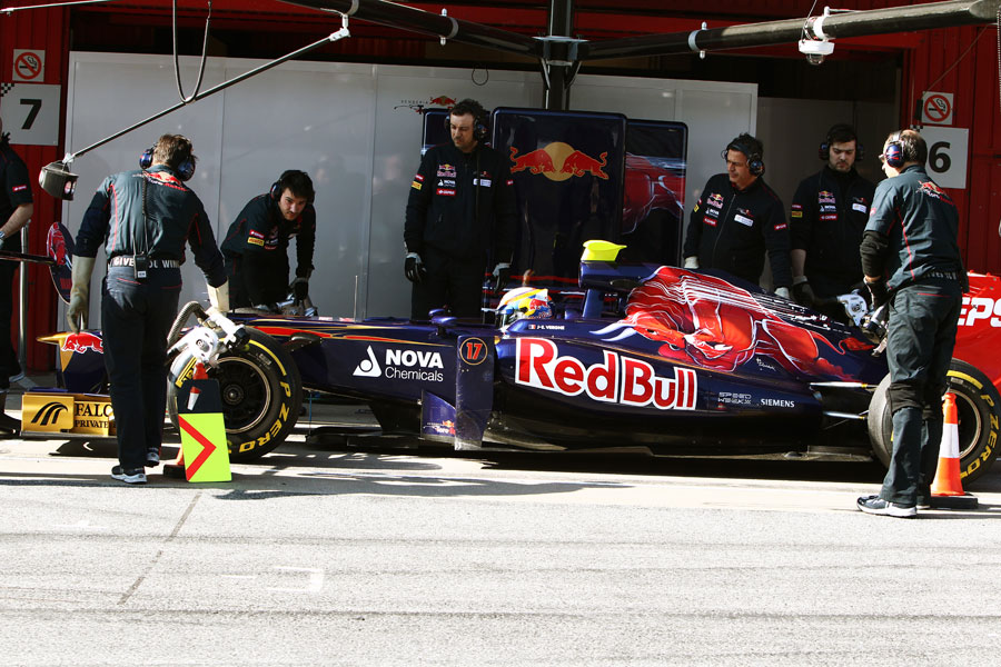 Jean-Eric Vergne hits his marks outside the Toro Rosso garage