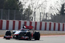 Jenson Button speeds towards turn 10 late in the day