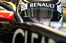 Kimi Raikkonen prepares to leave the pits