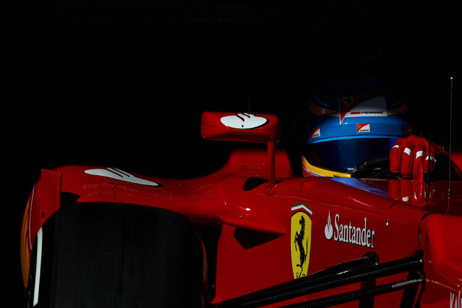 Fernando Alonso leaves the garage