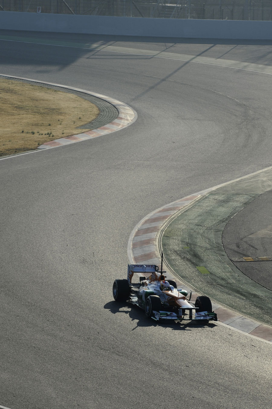Paul di Resta puts some early-morning miles on the Force India