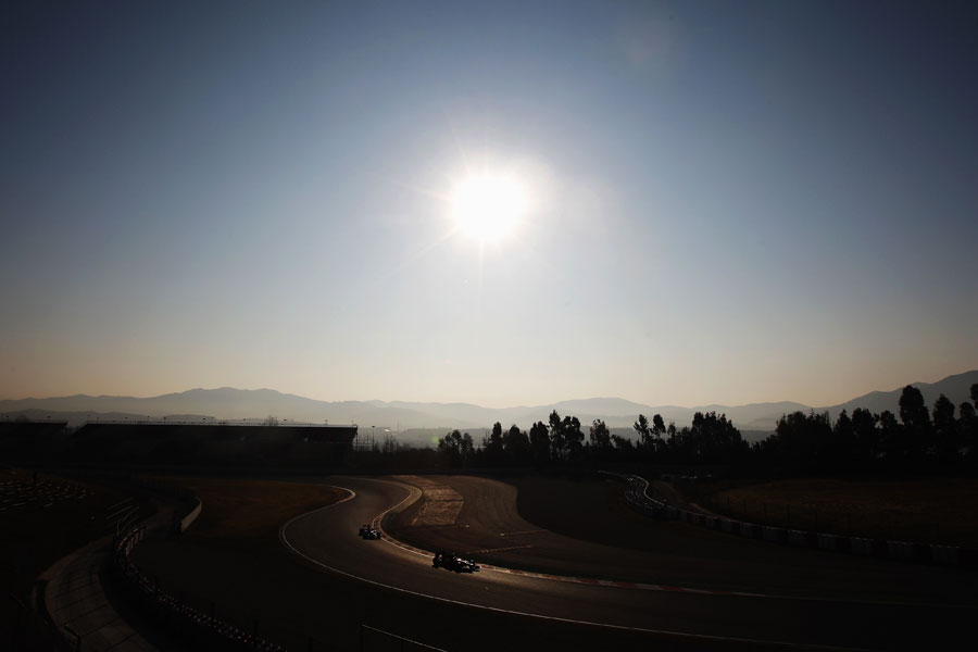 The opening corners of the Circuit de Catalunya bathed in early-morning sunlight