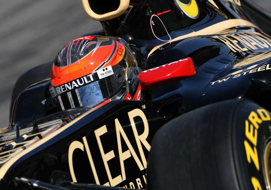 Romain Grosjean in the cockpit of the Lotus