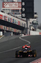 Daniel Ricciardo approaches turn one in the Toro Rosso