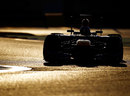 Sebastian Vettel aims for an apex in the early-morning light