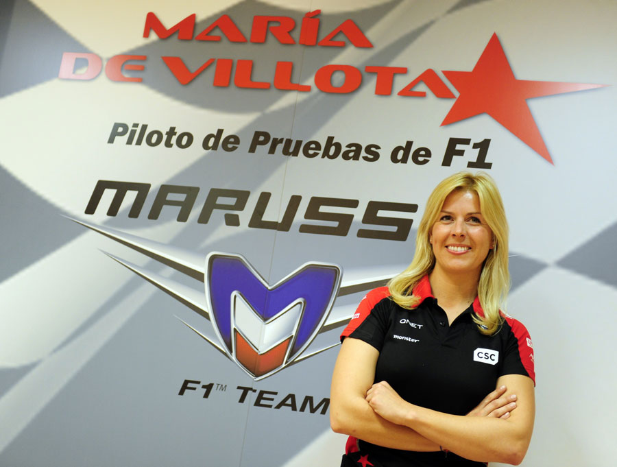 Marrusia test driver Maria de Villota poses for photos at a press conference