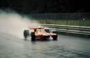 Tim Schenken drives through the spray in Frank Williams de Tomaso