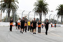 Team members walk the Albert Park track on Wednesday