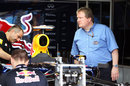 The FIA's Jo Bauer watches over work in the Red Bull garage