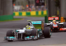 Nico Rosberg leads Lewis Hamilton through turn six