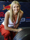 A Red Bull promo girl poses for a photo