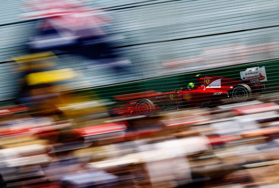 Felipe Massa passes trackside crowds during final practice