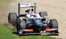 Kamui Kobayashi recovers his Sauber from the turn one gravel trap 