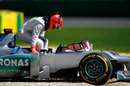 Michael Schumacher climbs out of his Mercedes after spinning off in final practice