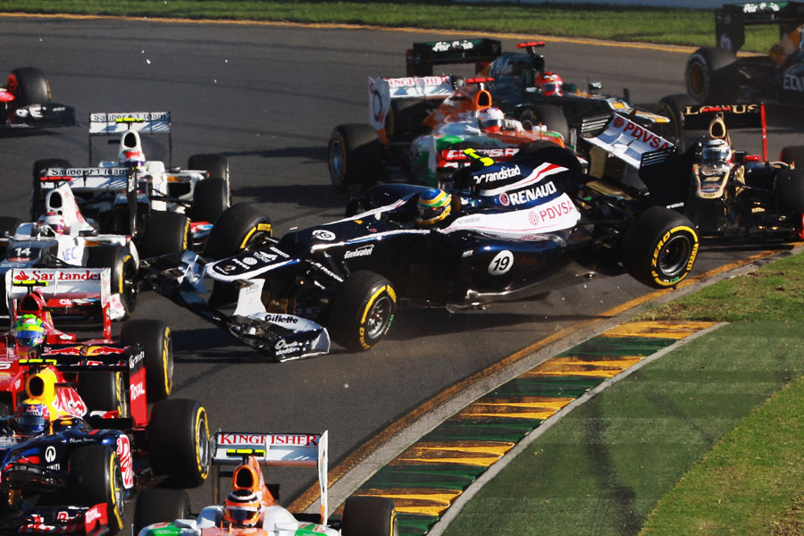 Bruno Senna and Daniel Ricciardo make contact at the start of the race