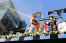 Jenson Button and Sebastian Vettel celebrate on the podium