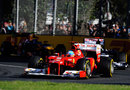 Fernando Alonso leads Pastor Maldonado and Mark Webber early in the race